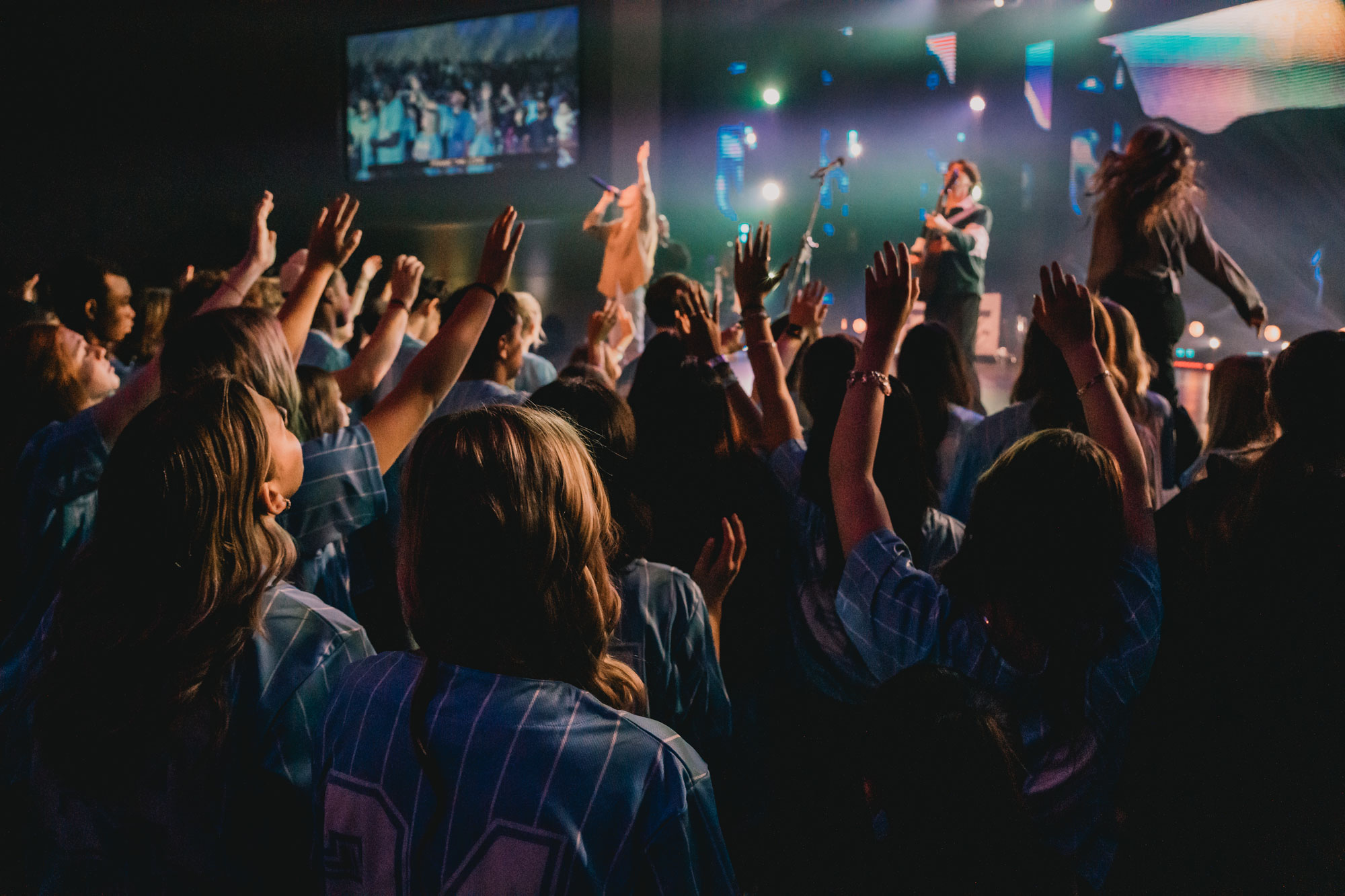 Rush Weekend students worshipping